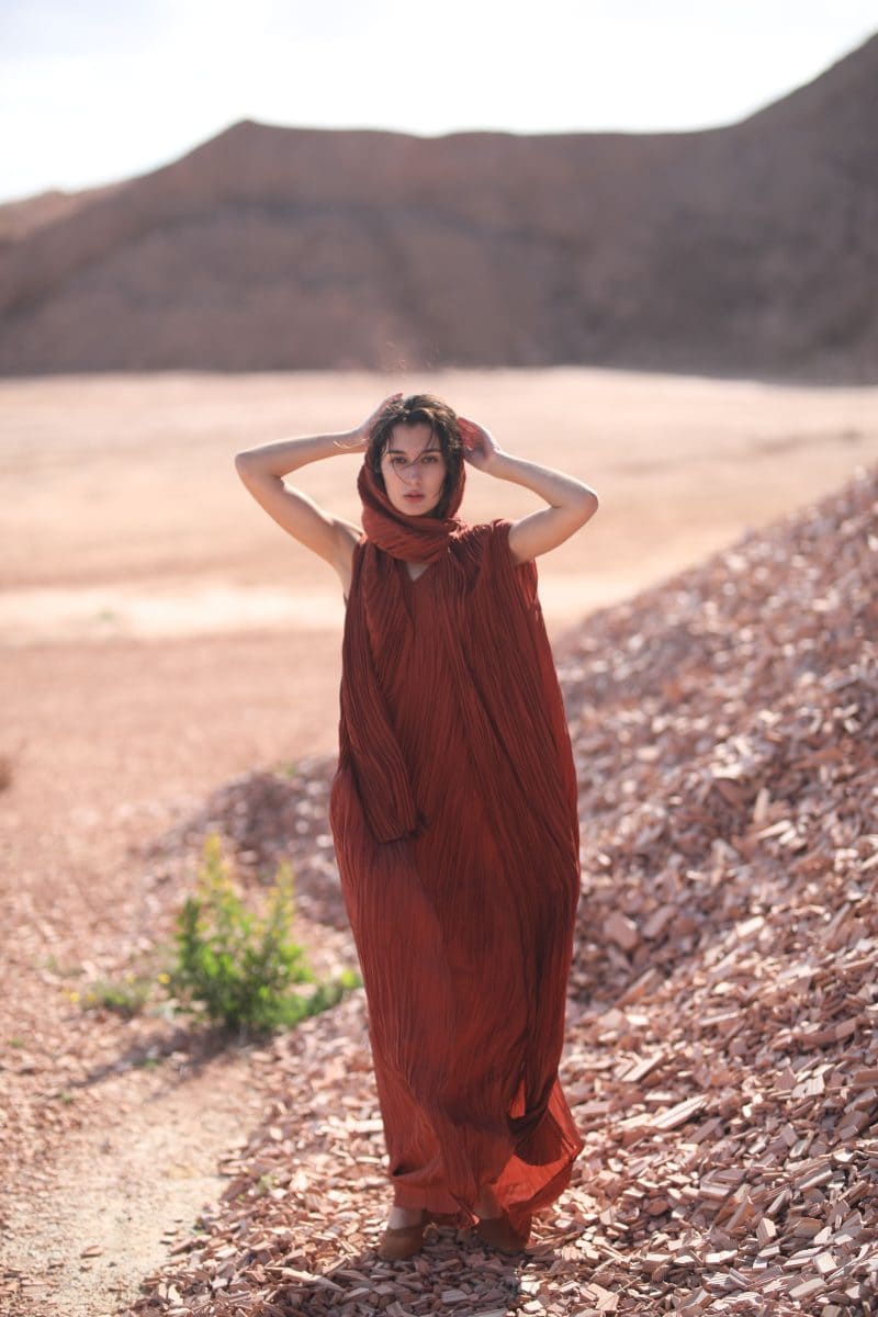 Close up of woman walking in desert