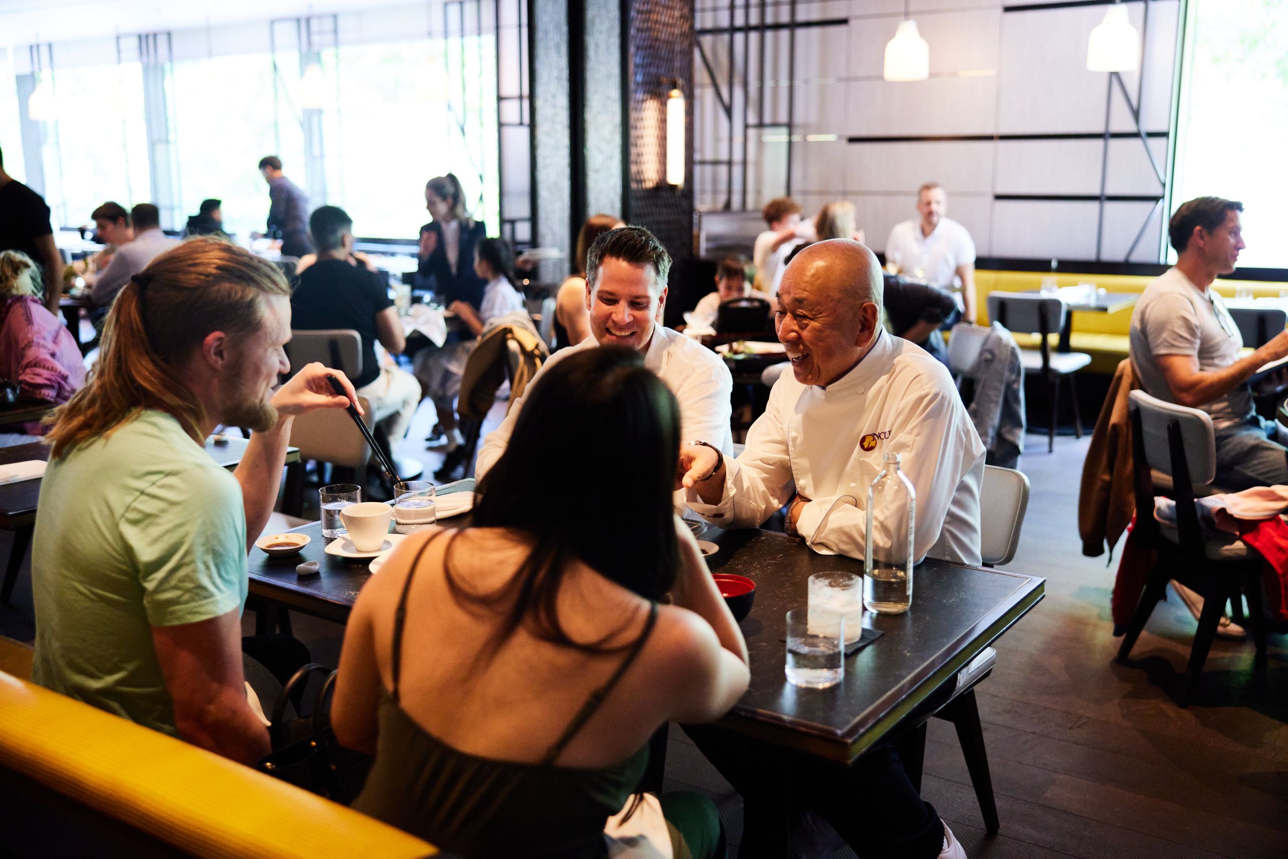 Chef Nobu In Nobu Restaurant with Guests