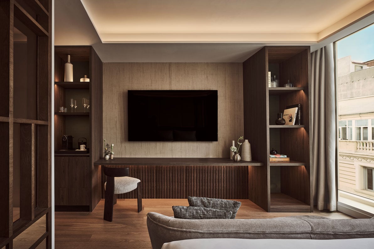 view of the tv and desk in the premium room city view
