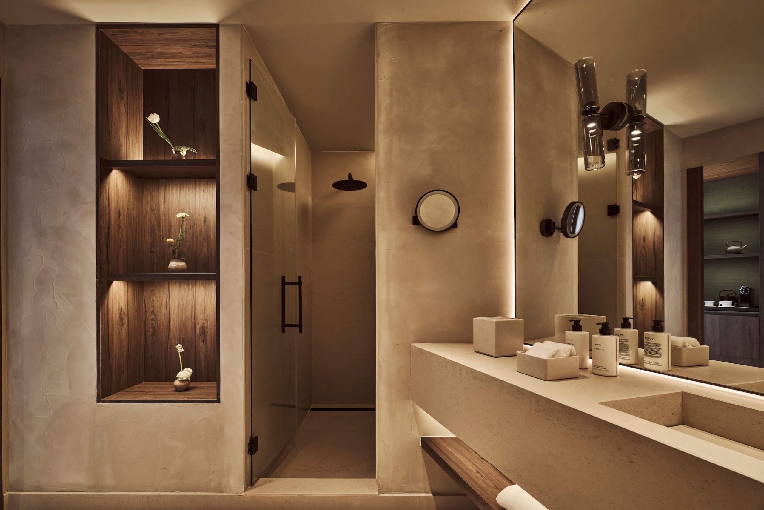 view of the shower next to shelves in yuhi suite
