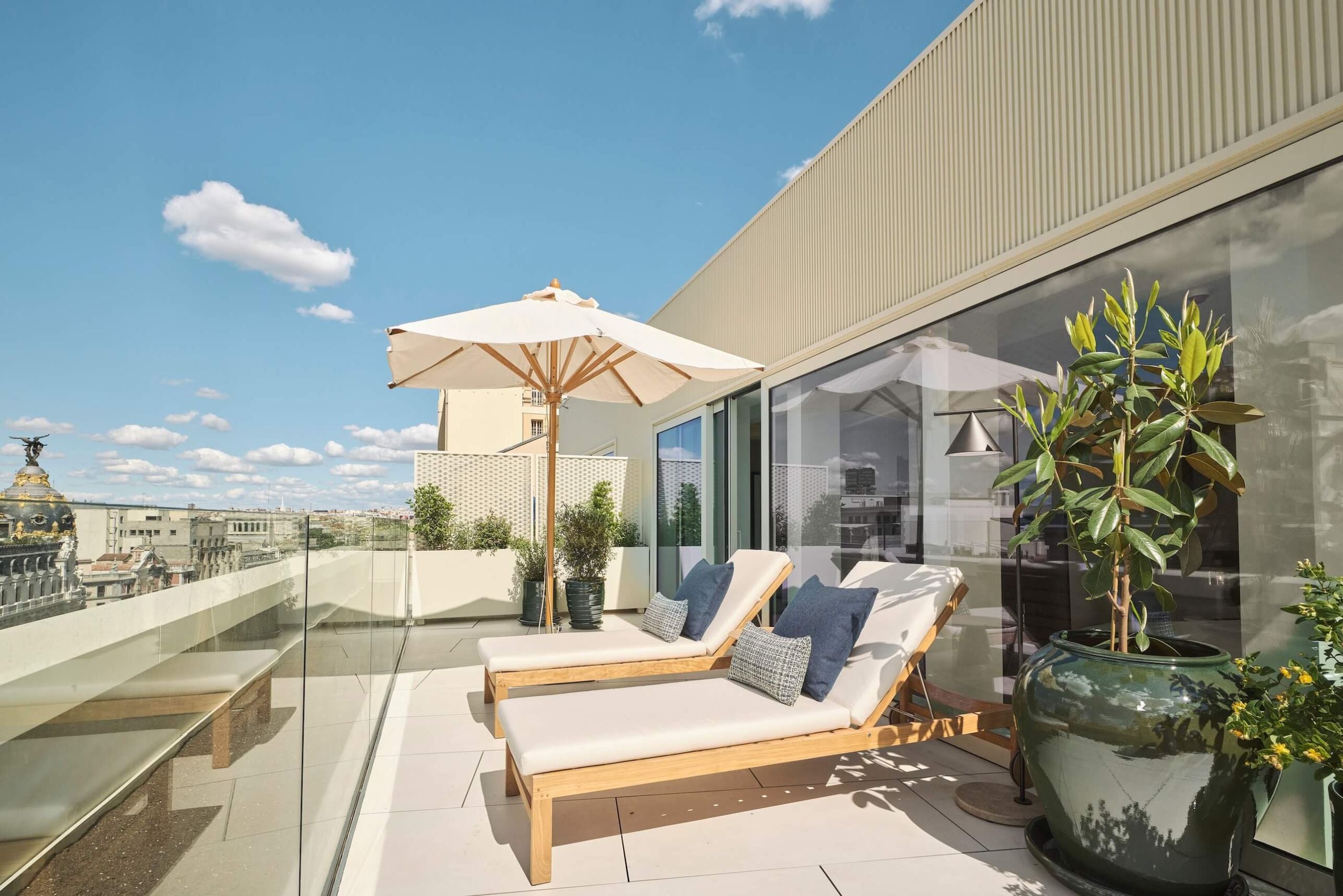 lounge chairs on the balcony of yuhi suite
