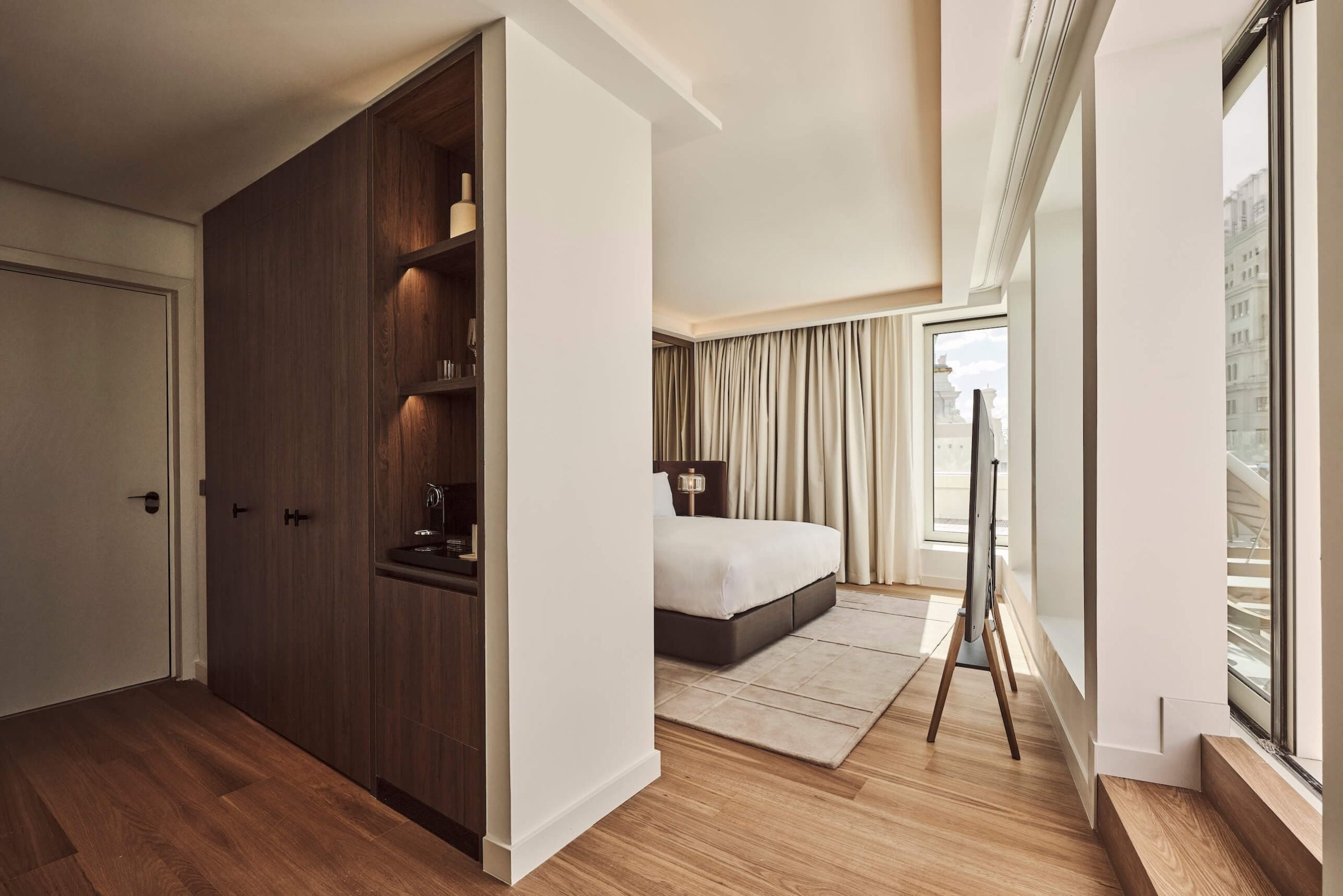 View of a cupboard & bed in yuhi suite