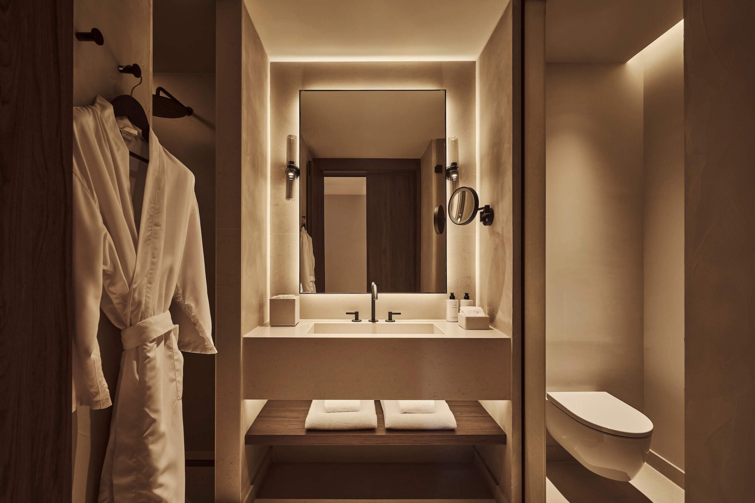 the bathroom sink and mirror in the zen suite